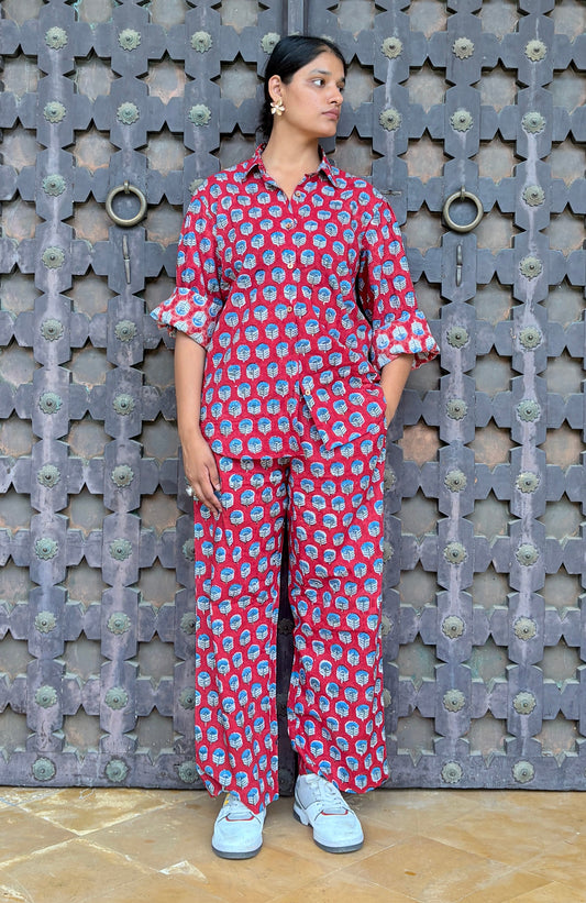 Close-up detail of blue floral block print on red cotton Rakshita co-ord set