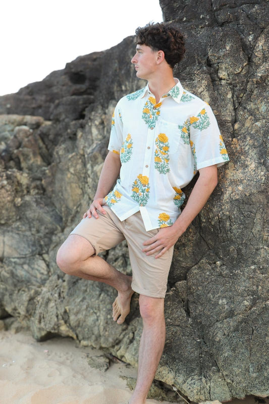 Person wearing yellow handwoven cotton unisex shirt