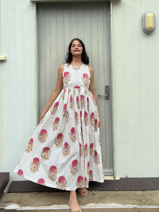 Mughal Bloom dress showing pink flowers and green leaf motifs