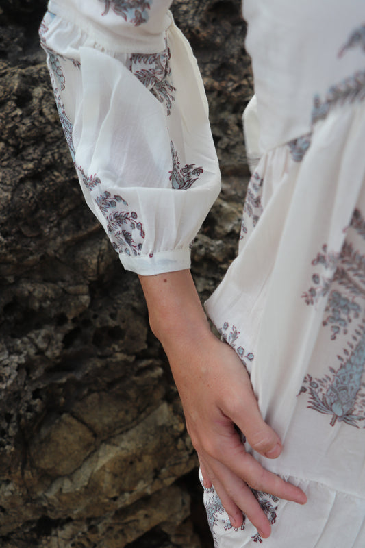Palm Haze dress showing grey hand-blocked palm motifs on white cotton