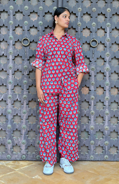 Close-up detail of blue floral block print on red cotton Rakshita co-ord set