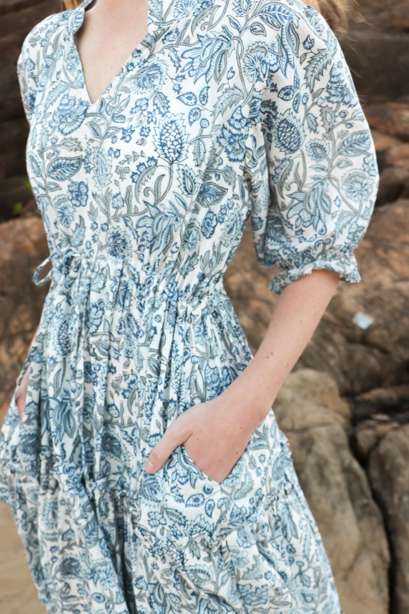 Sky Bloom blue maxi dress showing adjustable waist tie detail