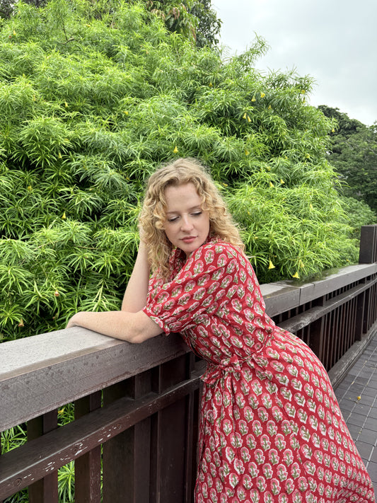 Crimson Hour red dress showing V-neckline and detachable belt