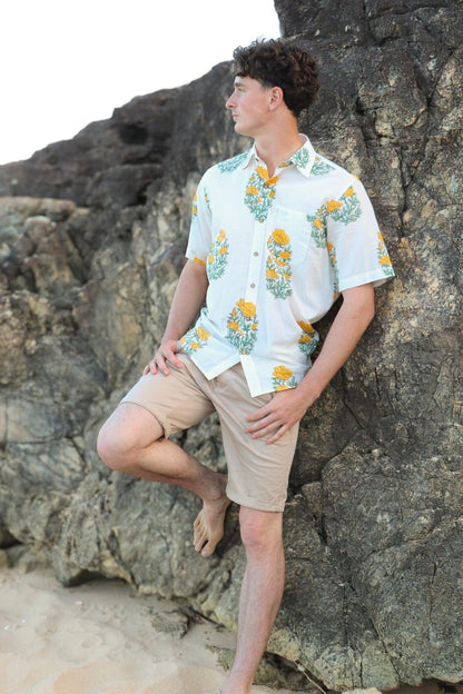 Person wearing yellow handwoven cotton unisex shirt