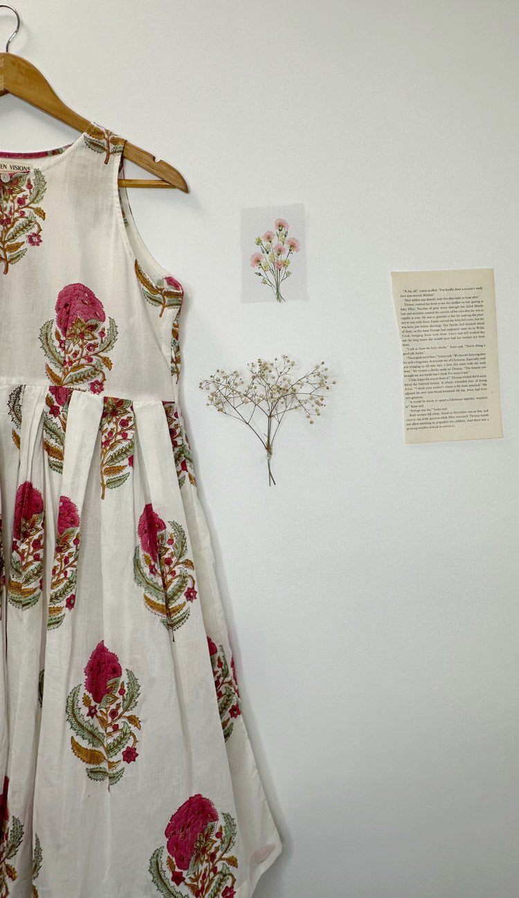 Close-up of cheerful pink floral block print on cotton