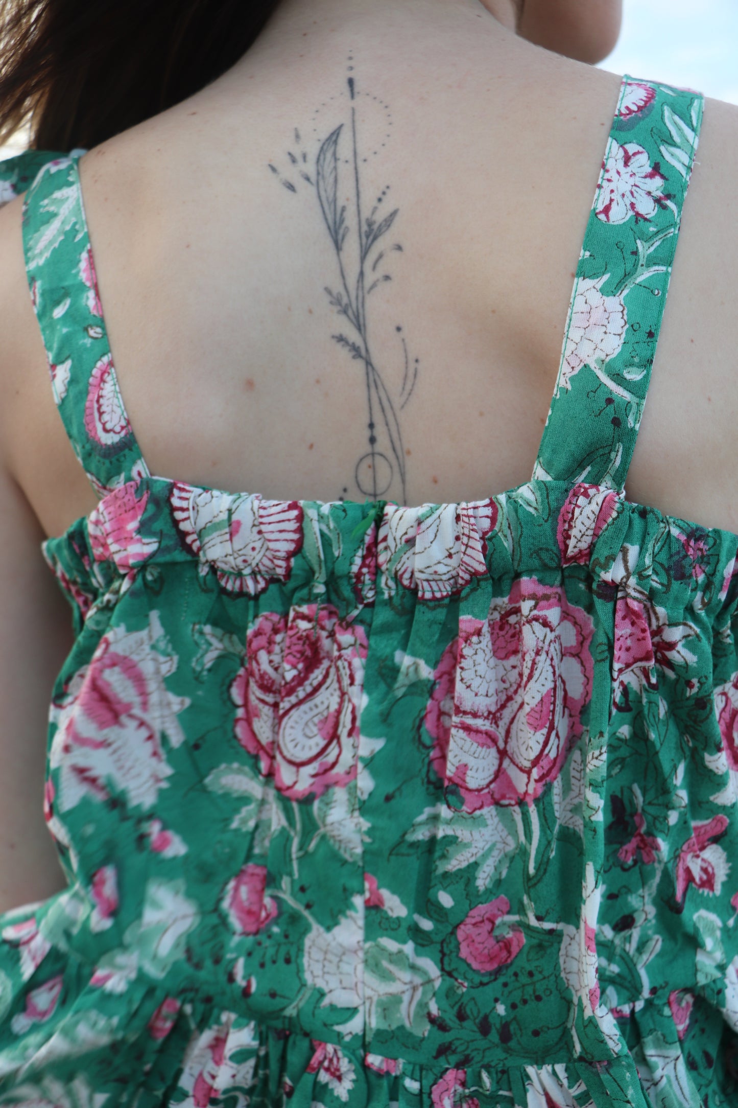 Olive Hour maxi dress showing elastic detail and side zip