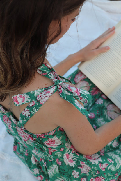 Olive Hour short dress showing subtle gathers and feminine details