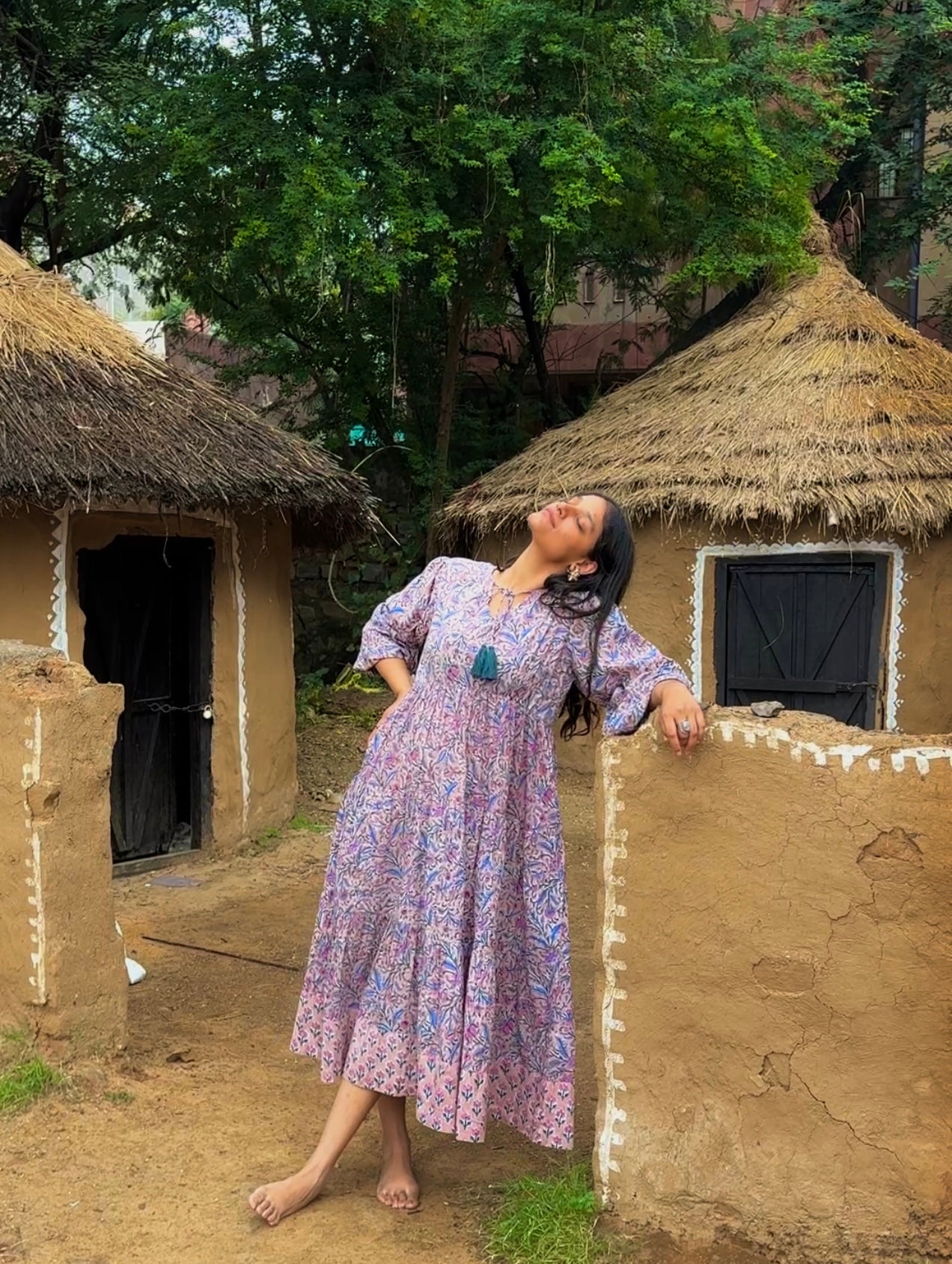 Full view of Deveshi dress showing balloon sleeves and three tiers