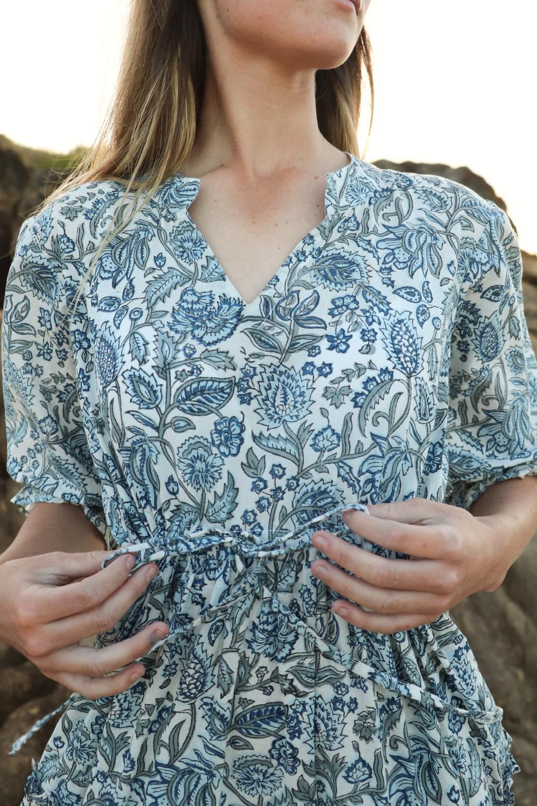 Sky Bloom blue maxi dress showing adjustable waist tie detail