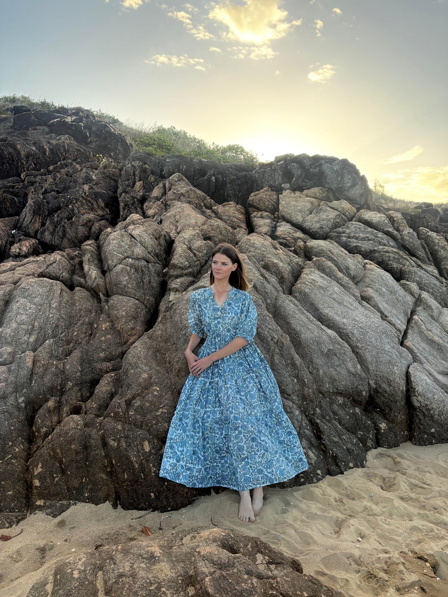 Full length view of sky blue tiered dress with flowy silhouette