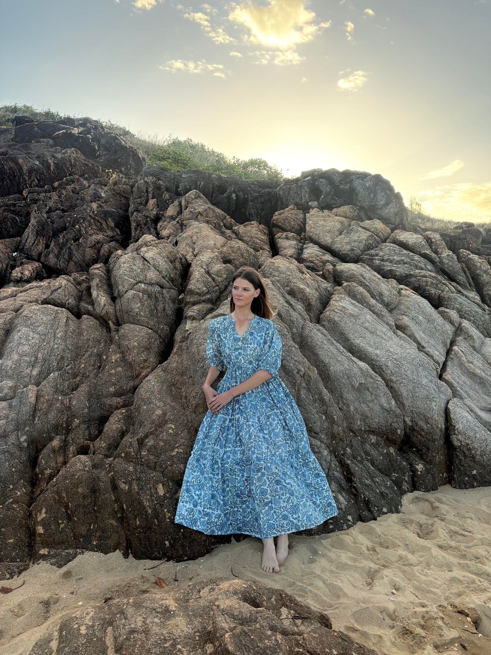 Full length view of sky blue tiered dress with flowy silhouette