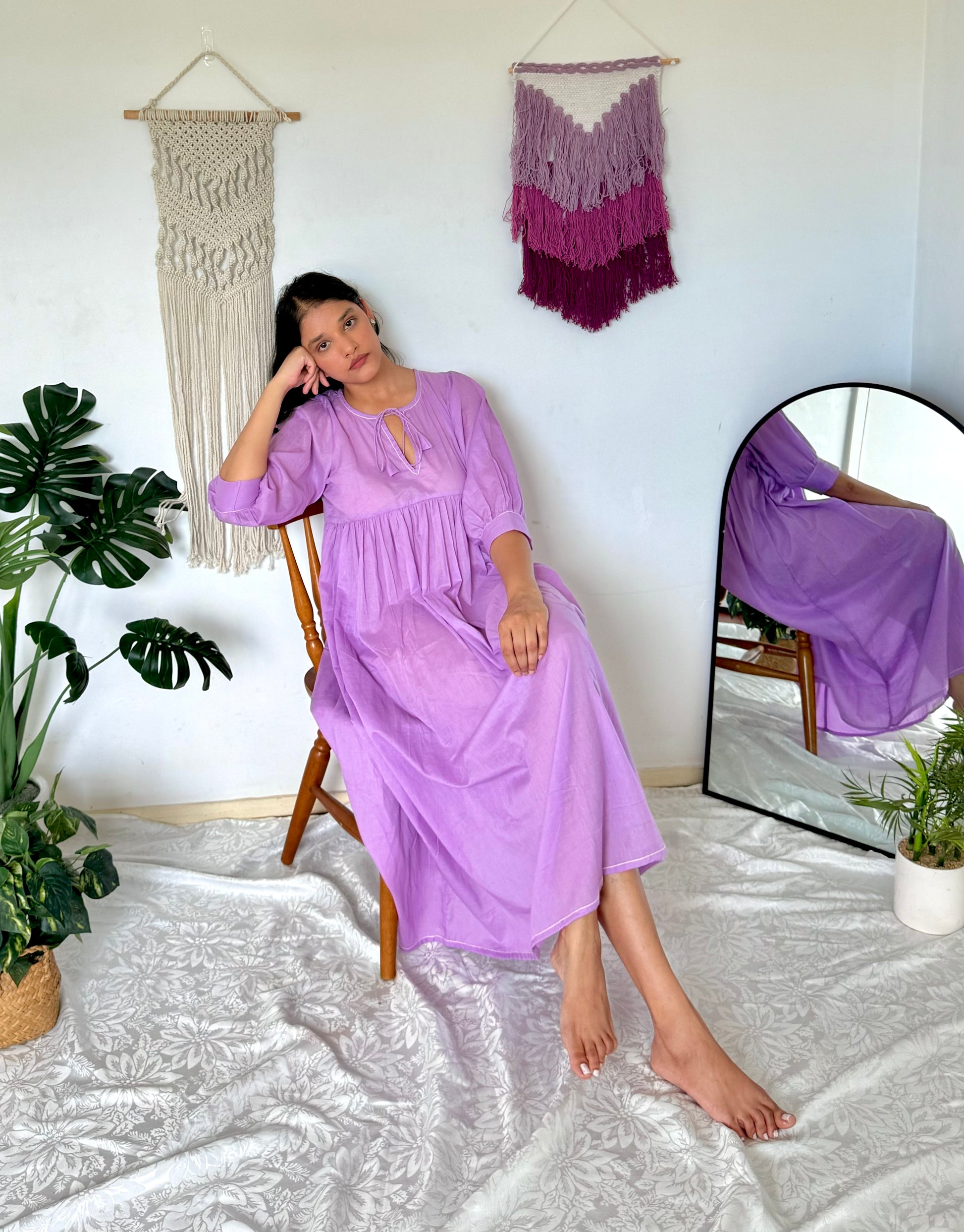 Woman wearing lavender mulmul cotton midi dress