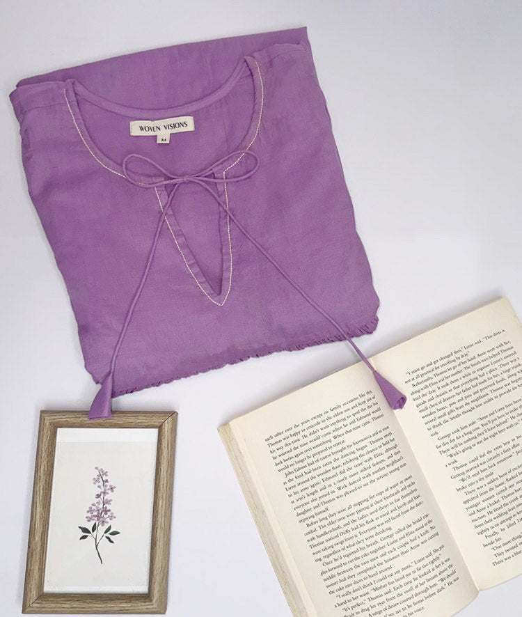 Close-up of gentle violet shade on lightweight mulmul fabric