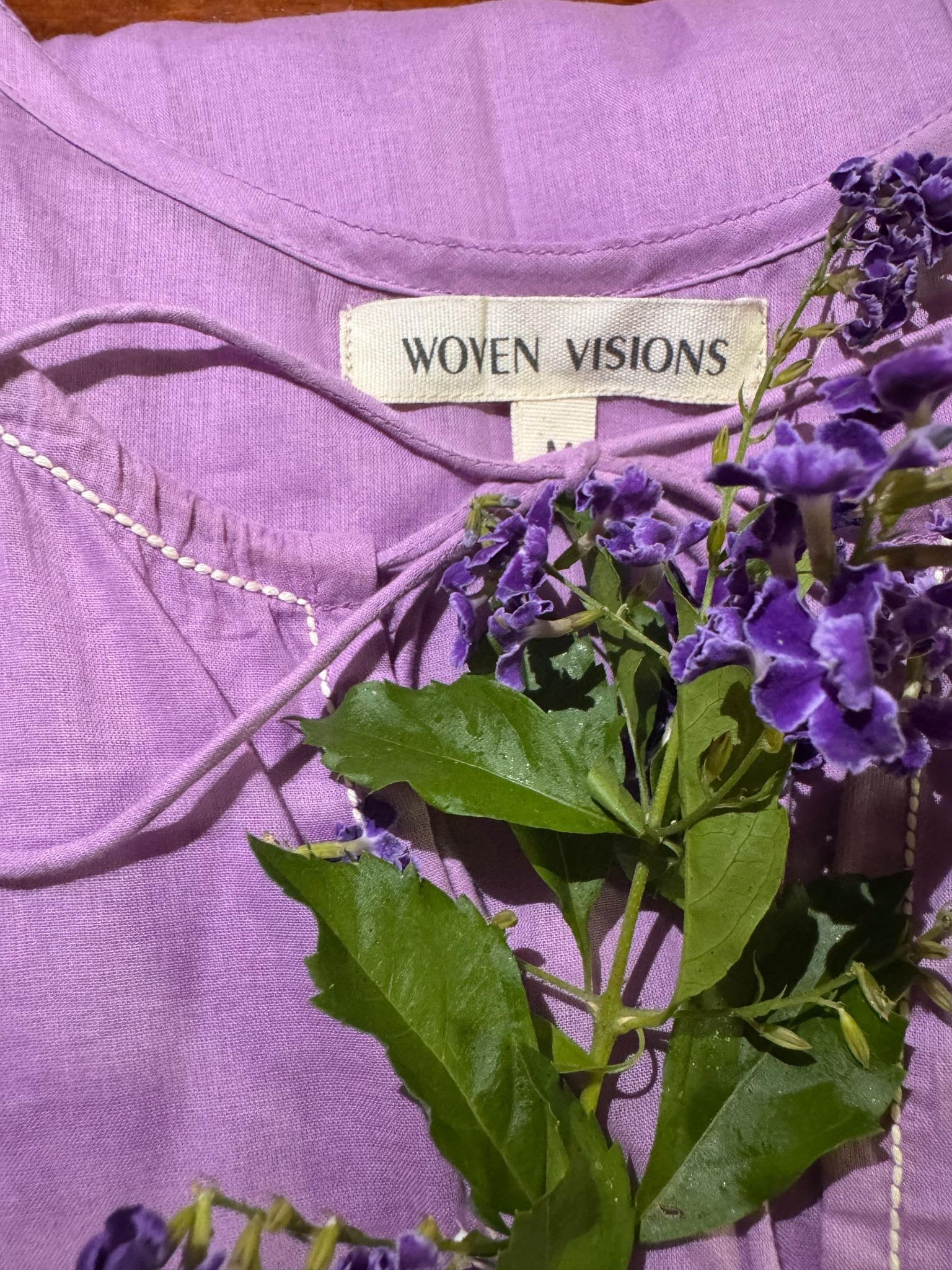Close-up of gentle violet shade on lightweight mulmul fabric