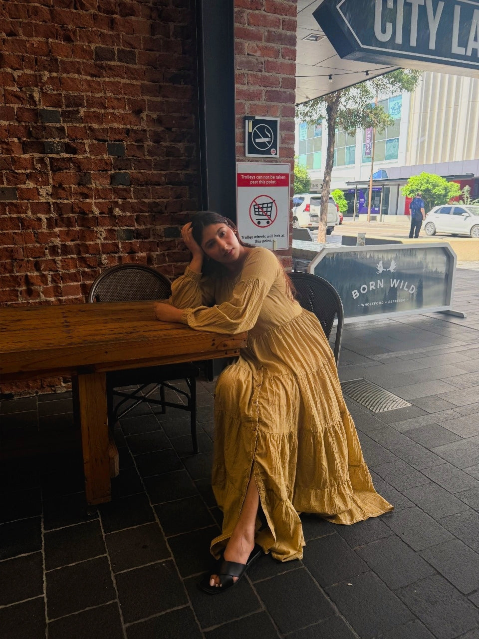 Close-up of natural mustard tone on lightweight mulmul cotton